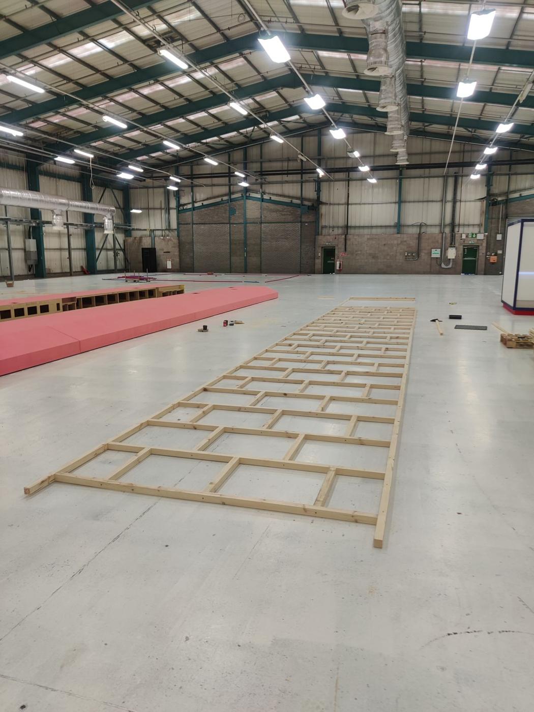 Timber frame laid out on the floor