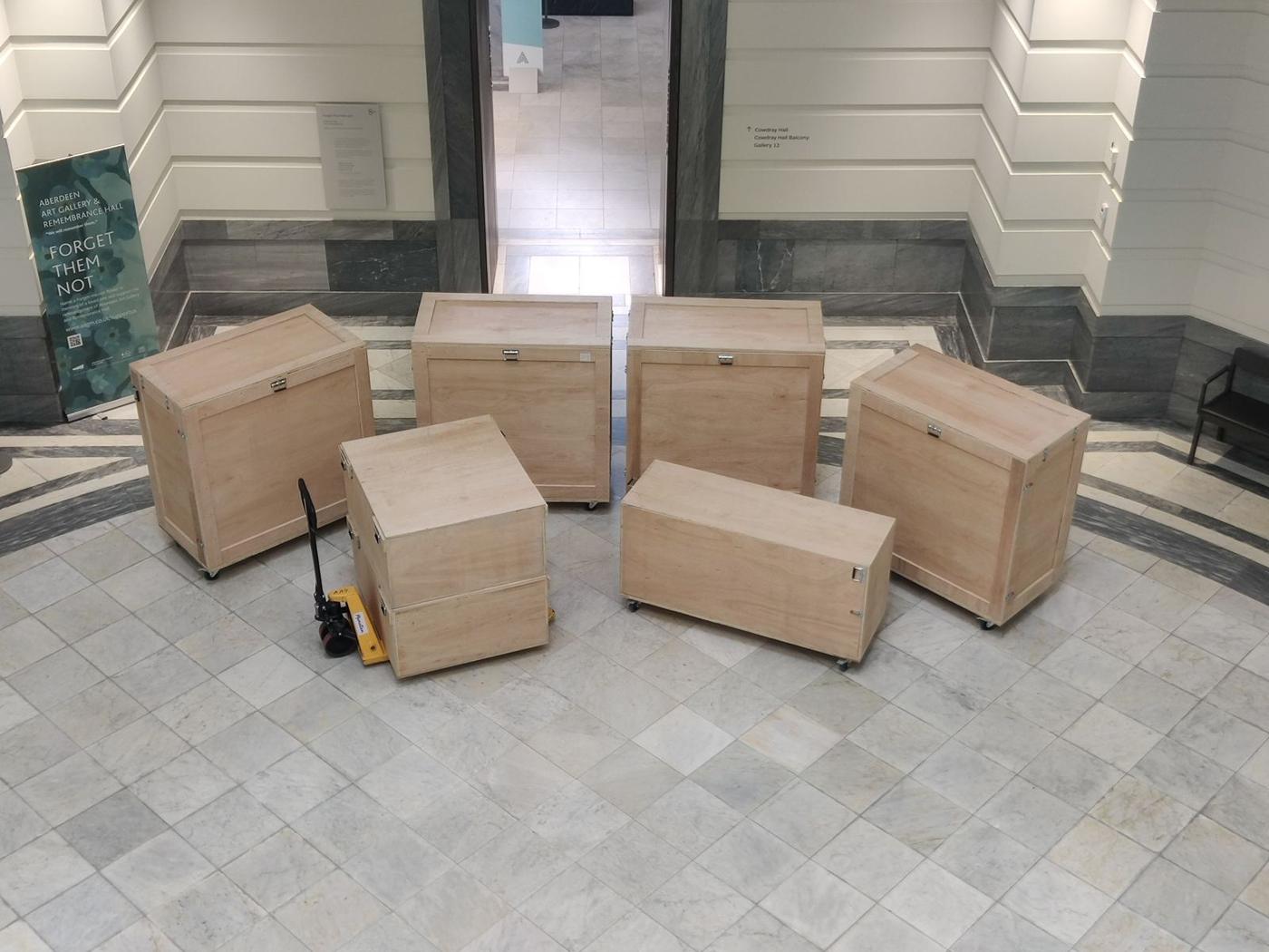 Tea Green crates in a venue
