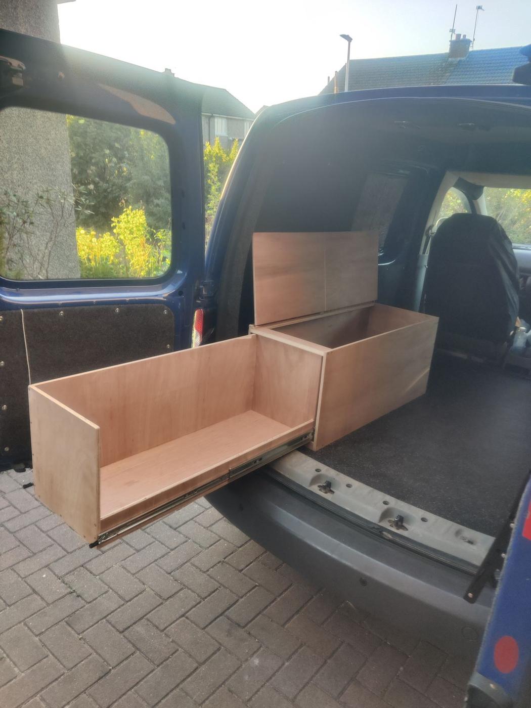 Furniture being fitted in the van
